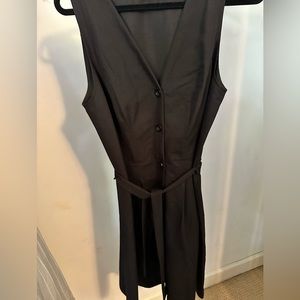 LBD: black dress with buttons down the front and waist tie